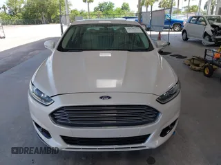 2016 Ford Fusion Titanium with VIN 3FA6P0K96GR390989, listed as a IAAI auction lot 42634275 with 123,559 mi miles and . Bid and sale history available at DreamBid. Image 12.