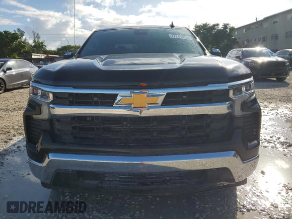 2024 Chevrolet Silverado 1500 LT with VIN 1GCPACEK7RZ172204, listed as a Copart auction lot 77741014 with 9,590 mi miles and Salvage Title. Bid and sale history available at DreamBid. Image 5.