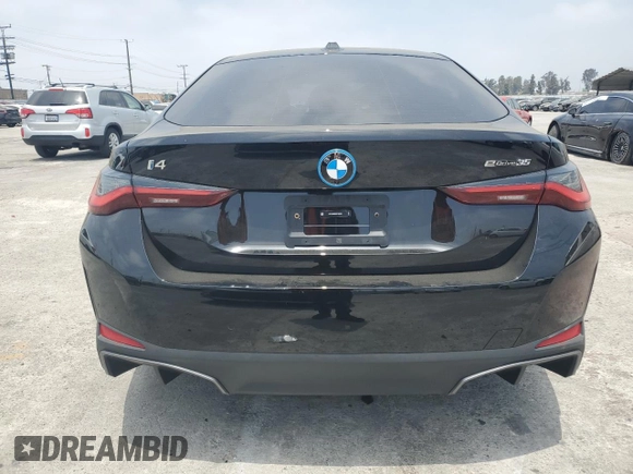 2024 BMW i4 eDrive35 with VIN WBY43AW02RFT03098, listed as a Copart auction lot 57317884 with 203 mi miles and Salvage Title. Bid and sale history available at carsss.com. Image 6.