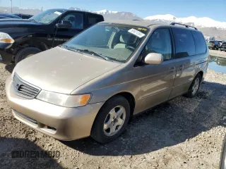 2000 Honda Odyssey EX z VIN 2HKRL1871YH549761, wystawiony jako Copart lot #50651355 z przebiegiem 176 243 mil mil oraz Czysty tytuł • Clean title. Historia ofert i sprzedaży dostępna na DreamBid. Obrazek 1.