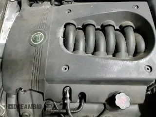 2005 Jaguar XK XK8 с VIN SAJDA42CX52A43323, выставлен на аукционе Copart как лот 84439154 с пробегом 98 389 миль миль и Списание • Salvage title. История ставок и продаж доступна на DreamBid. Изображение 13.