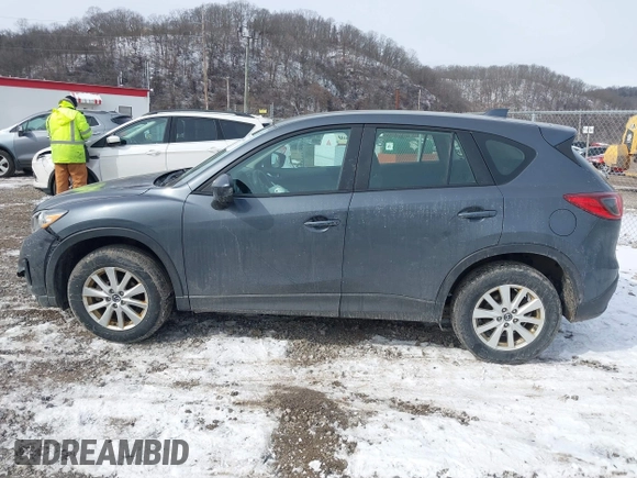 2013 Mazda CX-5 Sport z VIN JM3KE2BE9D0156274, wystawiony jako IAAI lot #41624466 z przebiegiem 159 017 mil mil oraz . Historia ofert i sprzedaży dostępna na DreamBid. Obrazek 14.