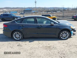 2020 Ford Fusion SE with VIN 3FA6P0LU4LR262988, listed as a IAAI auction lot 41768189 with 64,086 mi miles and . Bid and sale history available at DreamBid. Image 14.