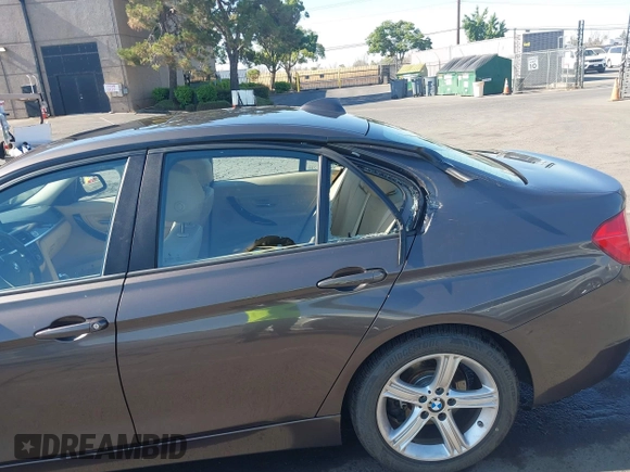 2014 BMW 3 Series 328i with VIN WBA3C1C57EK116483, listed as a IAAI auction lot 42697759 with 113,010 mi miles and . Bid and sale history available at DreamBid. Image 6.
