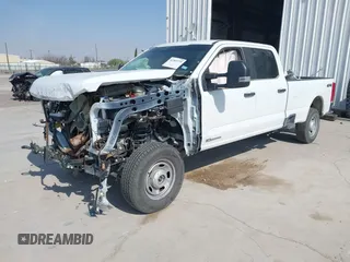 2024 Ford F-250 XL with VIN 1FT7W2BT2REE29043, listed as a IAAI auction lot 42307279 with 7,339 mi miles and . Bid and sale history available at DreamBid. Image 2.
