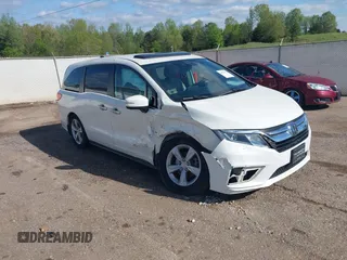 2018 Honda Odyssey EX-L z VIN 5FNRL6H76JB055283, wystawiony jako IAAI lot #41971612 z przebiegiem 71 854 mil mil oraz . Historia ofert i sprzedaży dostępna na DreamBid. Obrazek 1.
