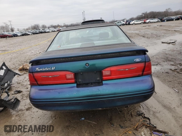 1996 Ford Thunderbird LX z VIN 1FALP6244TH118429, wystawiony jako Copart lot #47677935 z przebiegiem 167 726 mil mil oraz Szkoda całkowita • Salvage title. Historia ofert i sprzedaży dostępna na DreamBid. Obrazek 6.