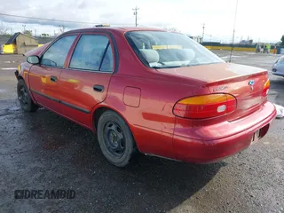 2001 Chevrolet Prizm z VIN 1Y1SK528X1Z406430, wystawiony jako IAAI lot #41789273 z przebiegiem 185 620 mil mil oraz . Historia ofert i sprzedaży dostępna na DreamBid. Obrazek 3.
