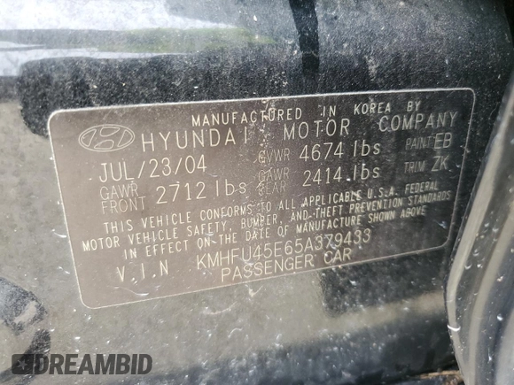 2005 Hyundai XG z VIN KMHFU45E65A379433, wystawiony jako Copart lot #73921434 z przebiegiem Nie podano mil oraz Szkoda całkowita • Salvage title. Historia ofert i sprzedaży dostępna na DreamBid. Obrazek 13.