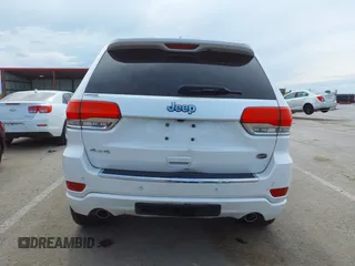 2016 Jeep Grand Cherokee Overland with VIN 1C4RJFCG2GC490420, listed as a IAAI auction lot 42200700 with 97,007 mi miles and . Bid and sale history available at DreamBid. Image 16.