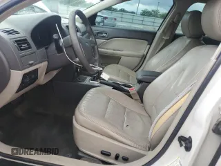 2012 Ford Fusion SEL with VIN 3FAHP0JA0CR249382, listed as a Copart auction lot 61173215 with 220,214 mi miles and Salvage title. Bid and sale history available at DreamBid. Image 7.