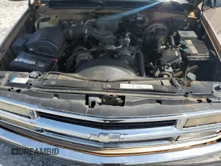 1999 Chevrolet Suburban with VIN 3GNEC16R6XG205408, listed as a Copart auction lot 57169415 with 303,412 mi miles and Salvage title. Bid and sale history available at DreamBid. Image 12.