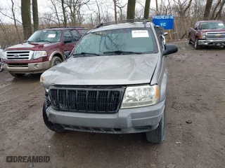 1999 Jeep Grand Cherokee Laredo with VIN 1J4GW58N0XC748809, listed as a IAAI auction lot 41722910 with 201,407 mi miles. Bid and sale history available at carsss.com. Image 12.