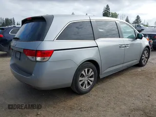 2016 Honda Odyssey EX-L with VIN 5FNRL5H60GB070789, listed as a IAAI auction lot 42148249 with 64,691 mi miles. Bid and sale history available at carsss.com. Image 4.