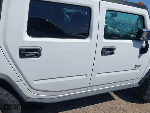 2003 Hummer H2 z VIN 5GRGN23U83H120658, wystawiony jako IAAI lot #41992183 z przebiegiem 226 207 mil mil oraz . Historia ofert i sprzedaży dostępna na DreamBid. Obrazek 13.