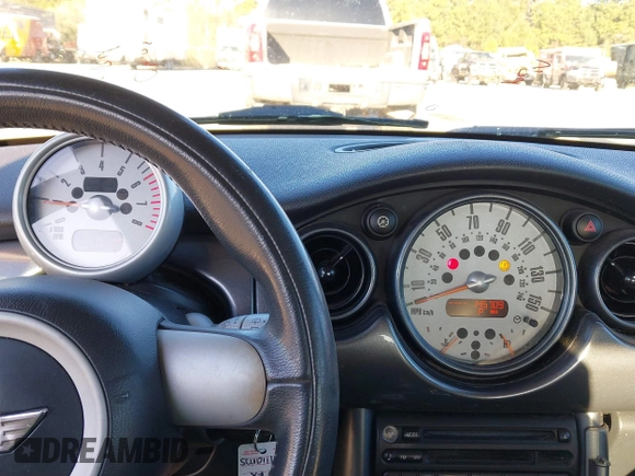 2006 MINI Hardtop with VIN WMWRC335X6TK16871, listed as a IAAI auction lot 41846929 with 145,709 mi miles and . Bid and sale history available at DreamBid. Image 7.