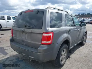 2010 Ford Escape XLT with VIN 1FMCU0D76AKA33885, listed as a IAAI auction lot 41837102 with 140,193 mi miles. Bid and sale history available at carsss.com. Image 4.