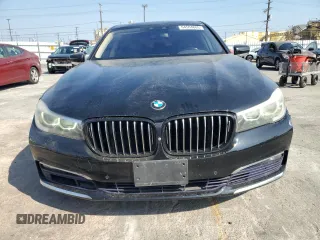 2017 BMW 7 Series 740i with VIN WBA7E2C50HG739565, listed as a Copart auction lot 64584885 with 114,496 mi miles and Salvage title. Bid and sale history available at DreamBid. Image 5.