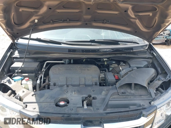 2016 Honda Odyssey EX-L with VIN 5FNRL5H61GB099699, listed as a IAAI auction lot 41807964 with 67,041 mi miles and . Bid and sale history available at DreamBid. Image 10.