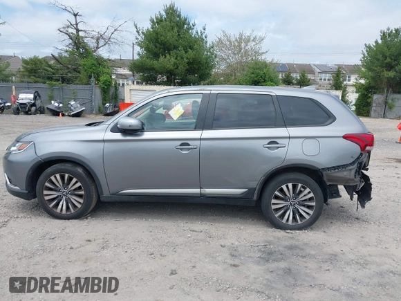 2020 Mitsubishi Outlander SE z VIN JA4AD3A37LZ044719, wystawiony jako IAAI lot #39303659 z przebiegiem 86 662 mil mil oraz . Historia ofert i sprzedaży dostępna na DreamBid. Obrazek 13.