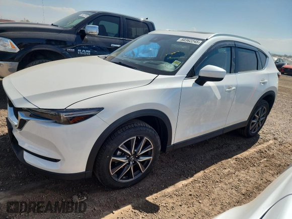 2018 Mazda CX-5 Grand Touring z VIN JM3KFBDM1J0473754, wystawiony jako Copart lot #60362245 z przebiegiem 72 792 mil mil oraz Szkoda całkowita • Salvage title. Historia ofert i sprzedaży dostępna na DreamBid. Obrazek 1.