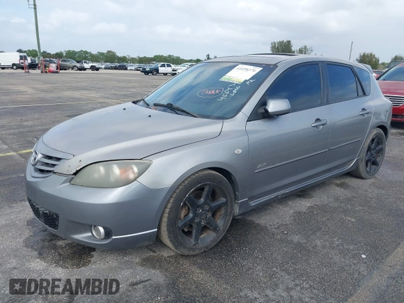 2006 Mazda 3 S Grand Touring with VIN JM1BK344X61456432, listed as a IAAI auction lot 41698370 with 193,980 mi miles and . Bid and sale history available at DreamBid. Image 2.
