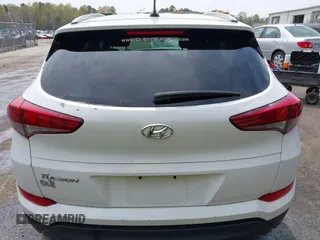 2017 Hyundai Tucson SE z VIN KM8J33A40HU383601, wystawiony jako IAAI lot #41947577 z przebiegiem 92 722 mil mil oraz . Historia ofert i sprzedaży dostępna na DreamBid. Obrazek 16.