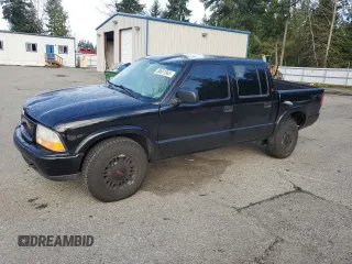 2001 GMC Sonoma SLS with VIN 1GTDT13W61K168519, listed as a Copart auction lot 50601565 with 0 mi miles and Salvage Title. Bid and sale history available at carsss.com. Image 1.