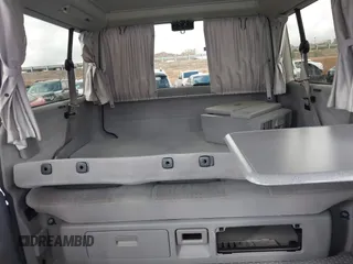 2002 Volkswagen EuroVan MV с VIN WV2NB47002H005993, выставлен на аукционе IAAI как лот 41568379 с пробегом 143 133 миль миль и . История ставок и продаж доступна на DreamBid. Изображение 8.