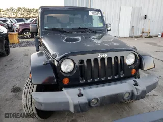 2007 Jeep Wrangler Unlimited Sahara with VIN 1J8GA59117L188579, listed as a Copart auction lot 79823624 with 68,322 mi miles and Clean Title. Bid and sale history available at carsss.com. Image 5.
