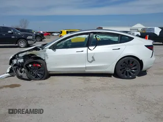 2021 Tesla Model 3 Performance with VIN 5YJ3E1EC8MF044388, listed as a IAAI auction lot 41821892 with Not Provided miles and . Bid and sale history available at carsss.com. Image 13.
