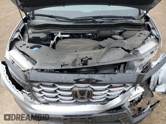 2023 Honda Passport TrailSport with VIN 5FNYF8H64PB044233, listed as a Copart auction lot 53522015 with 10,458 mi miles and Salvage title. Bid and sale history available at DreamBid. Image 11.