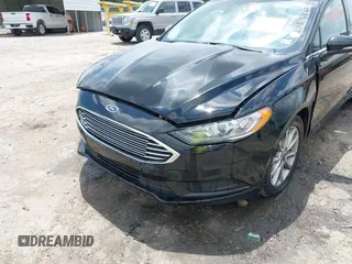 2017 Ford Fusion SE z VIN 3FA6P0H71HR363643, wystawiony jako IAAI lot #42764856 z przebiegiem 82 805 mil mil oraz . Historia ofert i sprzedaży dostępna na DreamBid. Obrazek 6.