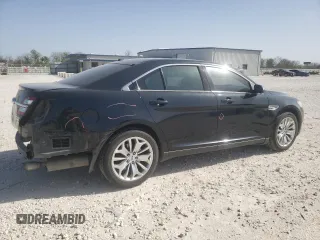 2015 Ford Taurus Limited with VIN 1FAHP2F83FG106102, listed as a Copart auction lot 49819005 with 100,925 mi miles and Salvage Title. Bid and sale history available at DreamBid. Image 3.