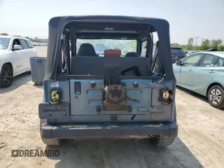 1999 Jeep Wrangler SE with VIN 1J4FY29P0XP422425, listed as a Copart auction lot 60513335 with Not provided miles and Clean title. Bid and sale history available at DreamBid. Image 6.