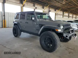 2022 Jeep Wrangler Unlimited High Tide with VIN 1C4HJXDG2NW221829, listed as a Copart auction lot 64836074 with 3,394 mi miles and Salvage Title. Bid and sale history available at DreamBid. Image 4.