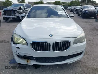 2014 BMW 7 Series 740i with VIN WBAYA6C53ED144195, listed as a IAAI auction lot 41720500 with 123,776 mi miles and . Bid and sale history available at DreamBid. Image 12.