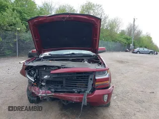 2017 Chevrolet Silverado 1500 LT with VIN 3GCUKREC5HG319937, listed as a IAAI auction lot 42073970 with 99,219 mi miles and . Bid and sale history available at DreamBid. Image 13.