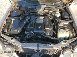 2000 Mercedes-Benz E-Class with VIN WDBJH65J4YB071699, listed as a Copart auction lot 75082144 with 105,989 mi miles and Salvage Title. Bid and sale history available at carsss.com. Image 12.