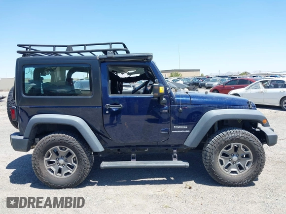 2013 Jeep Wrangler Sport with VIN 1C4AJWAG3DL627179, listed as a IAAI auction lot 42262246 with 33,536 mi miles and . Bid and sale history available at DreamBid. Image 13.