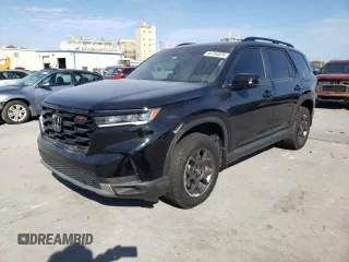 2023 Honda Pilot TrailSport with VIN 5FNYG1H66PB058087, listed as a Copart auction lot 84754824 with 26,278 mi miles and Salvage Title. Bid and sale history available at carsss.com. Image 1.