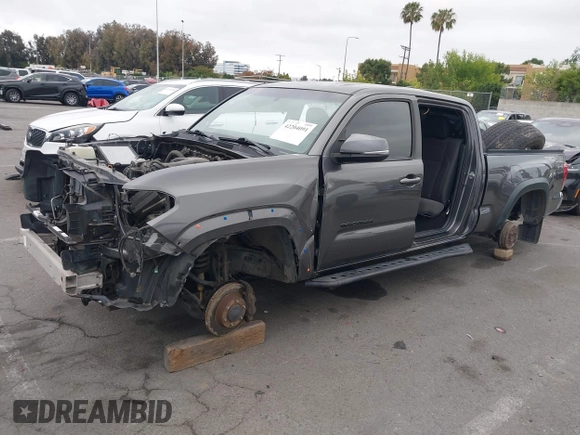 2017 Toyota Tacoma SR5 with VIN 3TMDZ5BN1HM021526, listed as a IAAI auction lot 42204091 with 82,802 mi miles and . Bid and sale history available at DreamBid. Image 6.