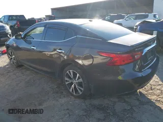 2016 Nissan Maxima Platinum with VIN 1N4AA6AP4GC434534, listed as a IAAI auction lot 41642540 with 143,413 mi miles and . Bid and sale history available at DreamBid. Image 3.
