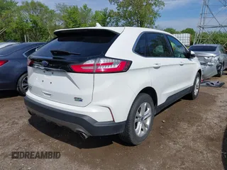 2020 Ford Edge SEL z VIN 2FMPK4J9XLBA07663, wystawiony jako IAAI lot #42115904 z przebiegiem 45 385 mil mil oraz . Historia ofert i sprzedaży dostępna na DreamBid. Obrazek 4.