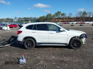 2018 BMW X1 xDrive28i with VIN WBXHT3C34J5L29714, listed as a IAAI auction lot 41825126 with 89,970 mi miles. Bid and sale history available at carsss.com. Image 13.