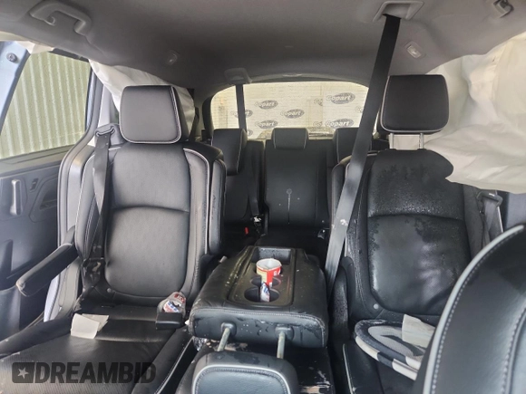 2023 Honda Odyssey Elite with VIN 5FNRL6H90PB071988, listed as a Copart auction lot 58589585 with 12,998 mi miles and Salvage title. Bid and sale history available at DreamBid. Image 10.