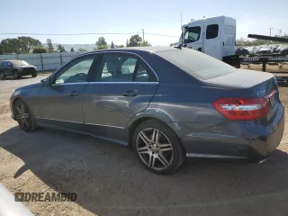 2010 Mercedes-Benz E 350 Luxury with VIN WDDHF5GB9AA059815, listed as a Copart auction lot 52856415 with 163,774 mi miles and Salvage Title. Bid and sale history available at carsss.com. Image 2.