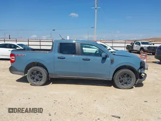 2022 Ford Maverick XL with VIN 3FTTW8F96NRA97616, listed as a IAAI auction lot 42146015 with Not Provided miles and . Bid and sale history available at DreamBid. Image 13.