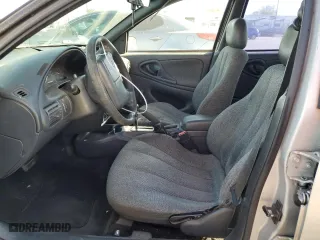 2001 Chevrolet Cavalier with VIN 1G1JC524717277609, listed as a Copart auction lot 77075584 with 211,562 mi miles and Salvage Title. Bid and sale history available at carsss.com. Image 7.