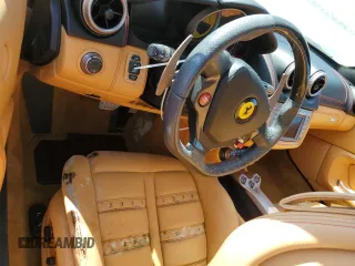 2014 Ferrari California z VIN ZFF65TJA2E0201735, wystawiony jako Copart lot #75178054 z przebiegiem Nie podano mil oraz Szkody całkowita. Historia ofert i sprzedaży dostępna na DreamBid. Obrazek 8.
